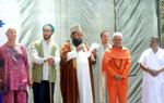 Imam Umer Ahmed Ilyasi, Chief Imam, All India Imam Organization delivering spiritual message in Portugal on World Yoga Day, on his left Jagat Guru Suryananda Maharaja, Portugese Yoga Confederation